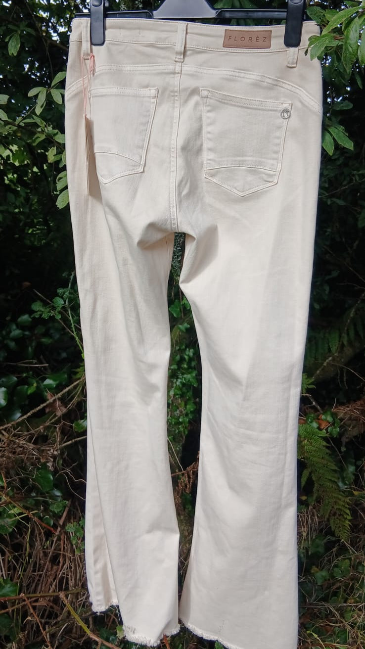 Light beige/cream denim jeans showing the back pockets and waistband by Florèz.