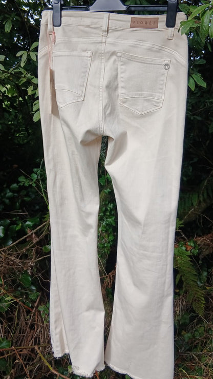 Light beige/cream denim jeans showing the back pockets and waistband by Florèz.