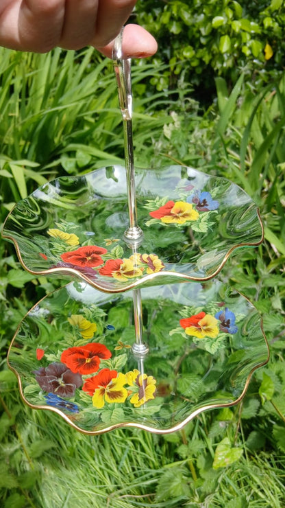 Vintage clear glass 2 tier cake stand with painted pansy and an elegant gold rim 